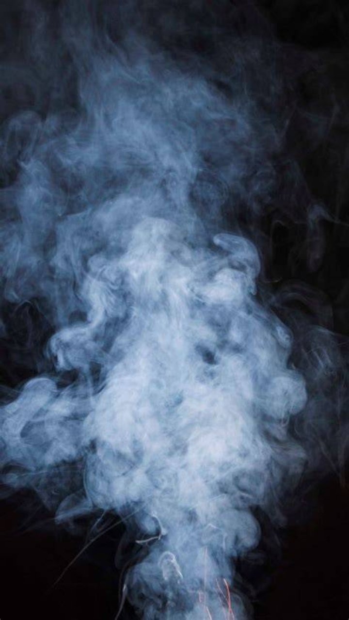 6300970 04.08.2020 Smoke rises after an explosion in Beirut, Lebanon. Mikhail Alaeddin / Sputnik via AP