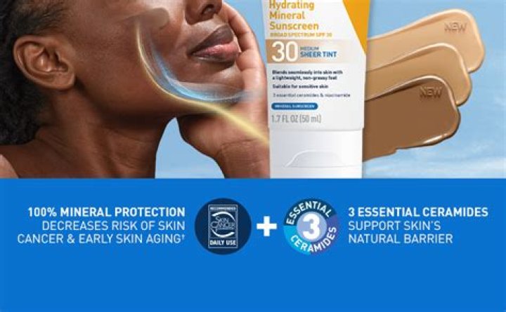 A container of sunscreen with a brush.