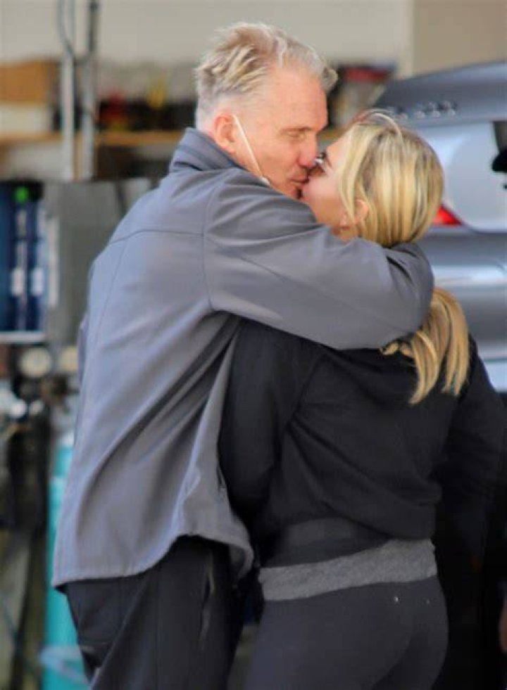 Action Star Dolph Lundgren, 63, Kisses Fiancee Emma Krokdal, 24 — See PDA Pics