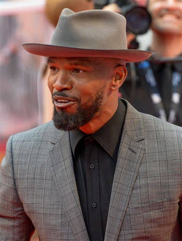 Actor Jamie Foxx, right, watches the teams warm up, before the NFL Super Bowl 53 football game between the Los Angeles Rams and the New England Patriots Sunday, Feb. 3, 2019, in Atlanta. (AP Photo/Mark Humphrey)