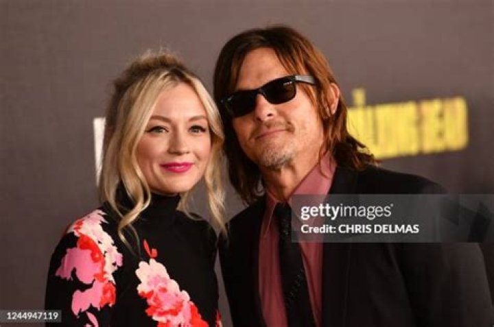 Actors Norman Reedus and Emily Kinney arrive at the season 4 premiere of "The Walking Dead" at the AMC Universal Citywalk Stadium 19/IMAX on in Universal City, Calif Season 4 Premiere of "The Walking Dead", Universal City, USA