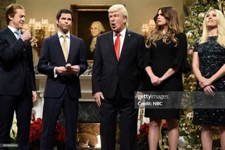 Alex Moffat as Eric Trump, Mikey Day as Donald Trump Jr., Alec Baldwin as Donald Trump