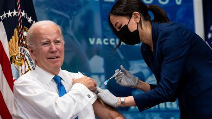 Alex Moffat Debuts As Joe Biden On ‘SNL’ While ‘Mike Pence’ Mistakenly Drops Trousers To Get COVID Vaccine