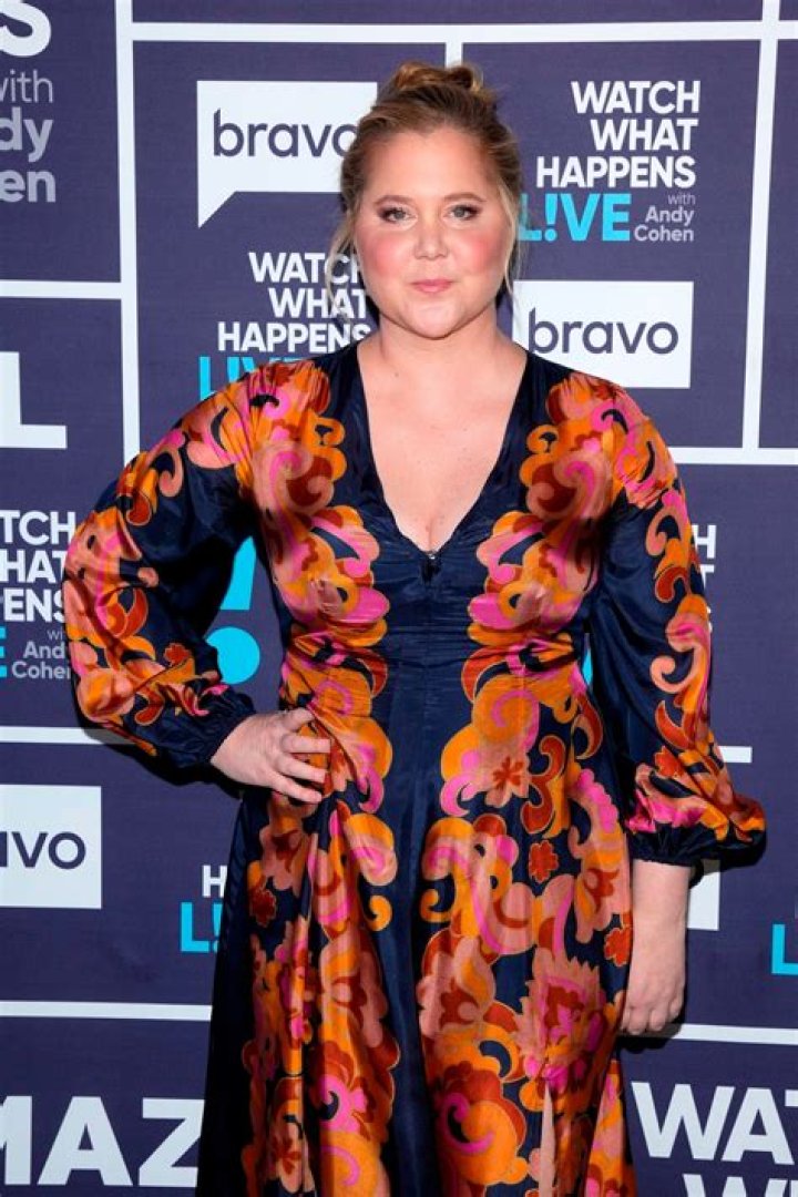 Amy Schumer trips in front of Kanye West and Kim Kardashian West at the TIME 100 Gala, celebrating the 100 most influential people in the world, at the Frederick P. Rose Hall, Time Warner Center, in New York 2015 TIME 100 Gala - Arrivals, New York, USA