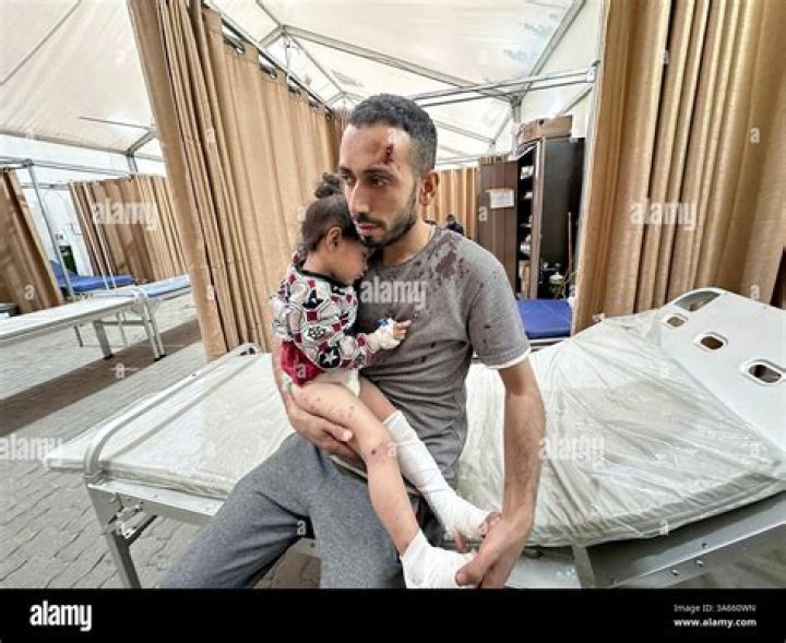 An injured girl is brought to the hospital for treatment