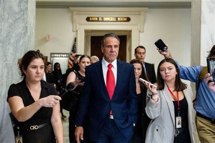 Andrew Cuomo & his crew get into a helicopter