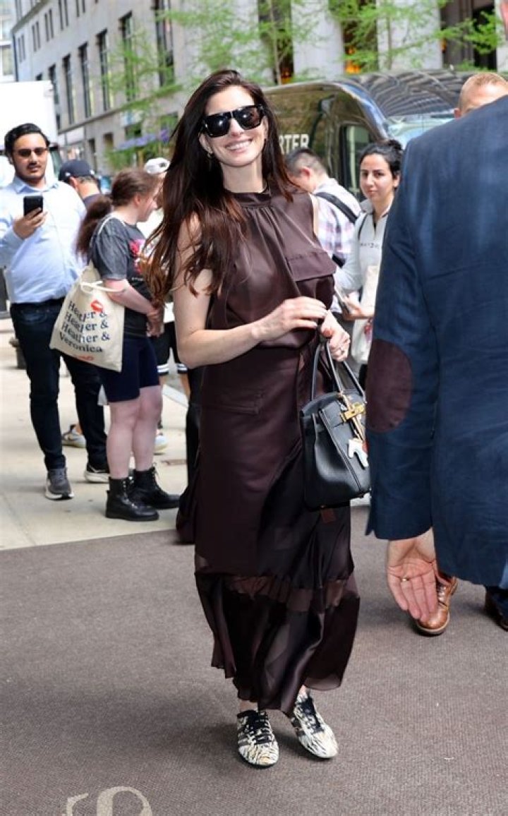 Anne Hathaway leaves her hotel during the 75th annual Cannes film festival at Palais des Festivals on May 20, 2022 in Cannes, France. Photo by Marco Piovanotto/ABACAPRESS.COM Pictured: Anne Hathaway Ref: SPL5311978 200522 NON-EXCLUSIVE Picture by: Marco Piovanotto/AbacaPress / SplashNews.com Splash News and Pictures USA: +1 310-525-5808 London: +44 (0)20 8126 1009 Berlin: +49 175 3764 166 United Arab Emirates Rights, Australia Rights, Bahrain Rights, Canada Rights, Greece Rights, India Rights, Israel Rights, South Korea Rights, New Zealand Rights, Qatar Rights, Saudi Arabia Rights, Singapore Rights, Thailand Rights, Taiwan Rights, United Kingdom Rights, United States of America Rights