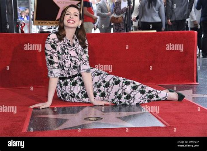 Anne Hathaway poses atop her new star on the Hollywood Walk of Fame following a ceremony in her honor, in Los Angeles Anne Hathaway Honored with a Star on the Hollywood Walk of Fame, Los Angeles, USA - 09 May 2019