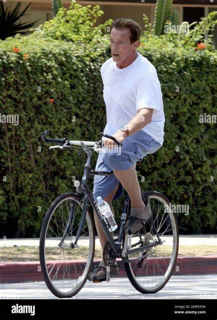 Arnold Schwarzenegger rides a bike with his son Joseph Baena Arnold Schwarzenegger out and about, Los Angeles, USA - 19 Jul 2020
