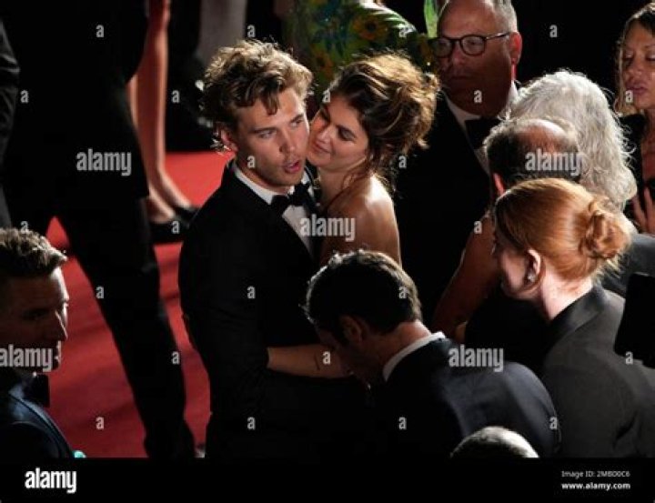 Austin Butler, left, and Kaia Gerber pose for photographers after departing the premiere of the film 'Elvis' at the 75th international film festival, Cannes, southern France 2022 Elvis Departures, Cannes, France - 25 May 2022
