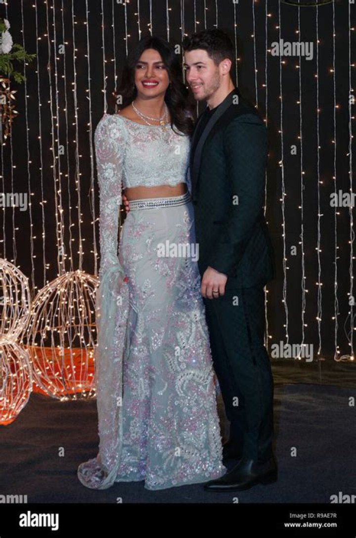 Bollywood actress Priyanka Chopra and musician Nick Jonas pose for photographs at their wedding reception in Mumbai, India Chopra Jonas Wedding, Mumbai, India - 20 Dec 2018