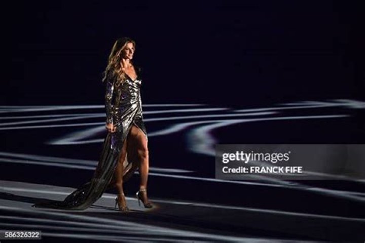 Brazilian model Gisele Bundchen walks down the runway during the Victoria's Secret Fashion show in New York. Whether it's sun-kissed skin or manufactured body tweaks, there's a certain something to beauty in Brazil that has global appeal. In hair, skin care, cosmetic surgery and body contouring, the cachet that will soon be on stage when the Olympics begin in August is as varied as Brazilians themselves _ among them supermodels Bundchen, Alessandra Ambrosio and Adriana LimaBrazil Beauty, NEW YORK, USA