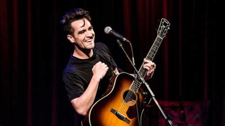 Brendon Urie with a guitar