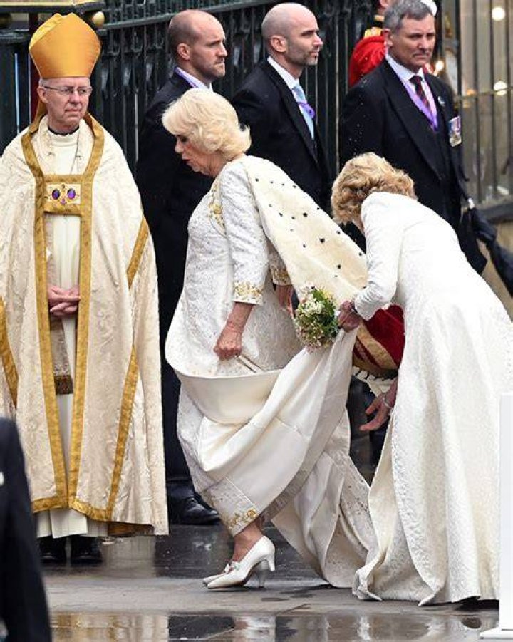 Camilla Parker Bowles smiles next to Prince Charles as they head to Westminster Abbey in their royal carriage on May 6, 2023