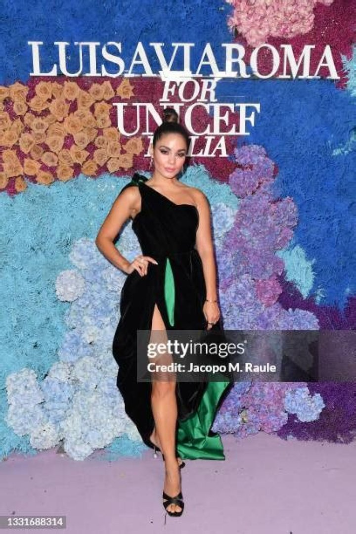 Capri, ITALY - Vanessa Hudgens spotted having a laugh and some wine on a night out at Taverna Anema e Core in Capri. The singer has was seen enjoying herself during a night out with her pals and even happily posed with Gianluigi Lembo. Pictured: Vanessa Hudgens BACKGRID USA 3 AUGUST 2022 BYLINE MUST READ: Cobra Team / BACKGRID USA: +1 310 798 9111 / UK: +44 208 344 2007 / *UK Clients - Pictures Containing Children Please Pixelate Face Prior To Publication*