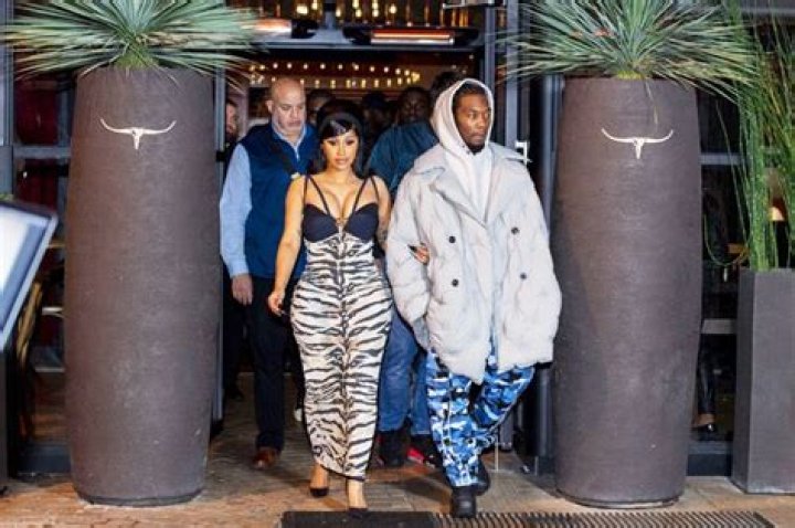Cardi B Rocks Extremely Plunging Dress While Holding Hands With Offset In Paris