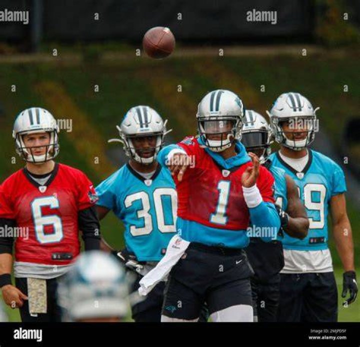 Carolina Panthers quarterback Cam Newton (1) stretches prior to an NFL football game against the Los Angeles Rams in Charlotte, N.C Rams Panthers Football, Charlotte, USA - 08 Sep 2019