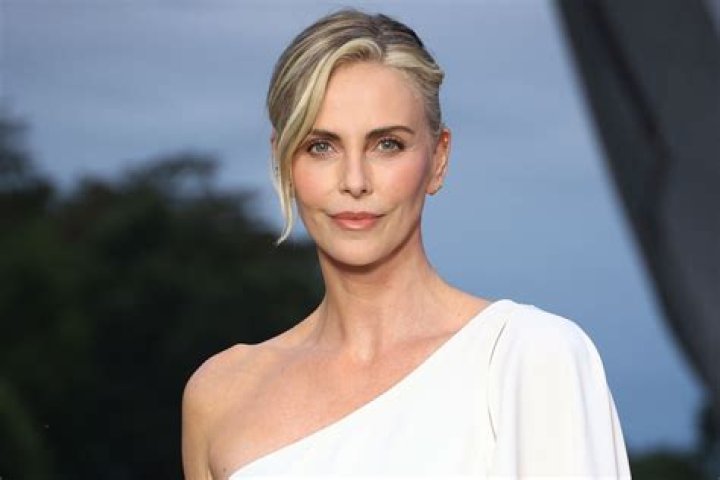 Charlize Theron Is Divine In Purple For The Hollywood Reporter&rsquo;s Women in Entertainment Breakfast