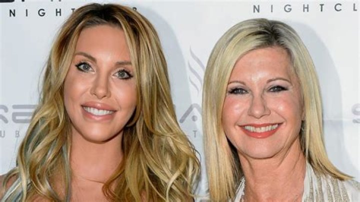 Chloe Lattanzi Wipes Away Tears As She Admits She ‘Talks To’ Late Mom Olivia Newton-John ‘Every Day’ In New Interview