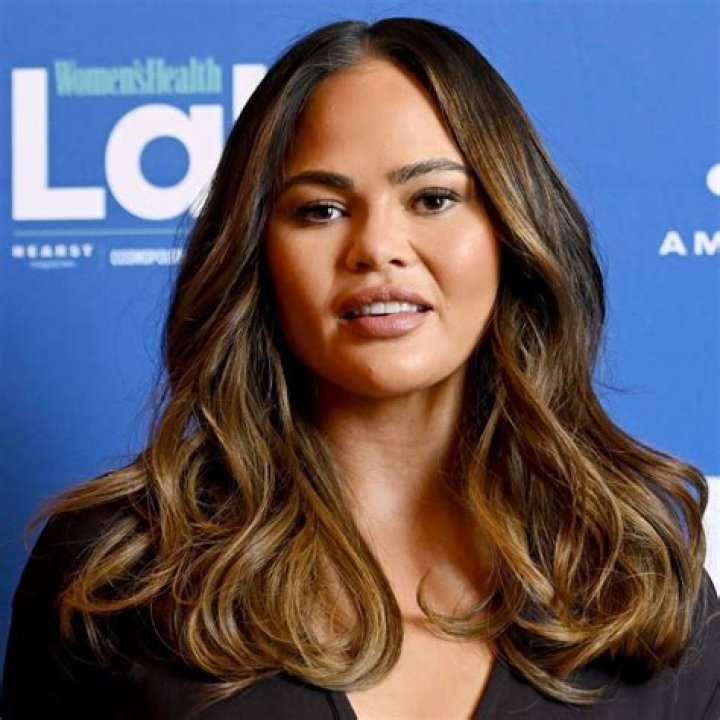 Chrissy Teigen Reveals Swollen & Bandaged Stomach After Endometriosis Surgery — Watch