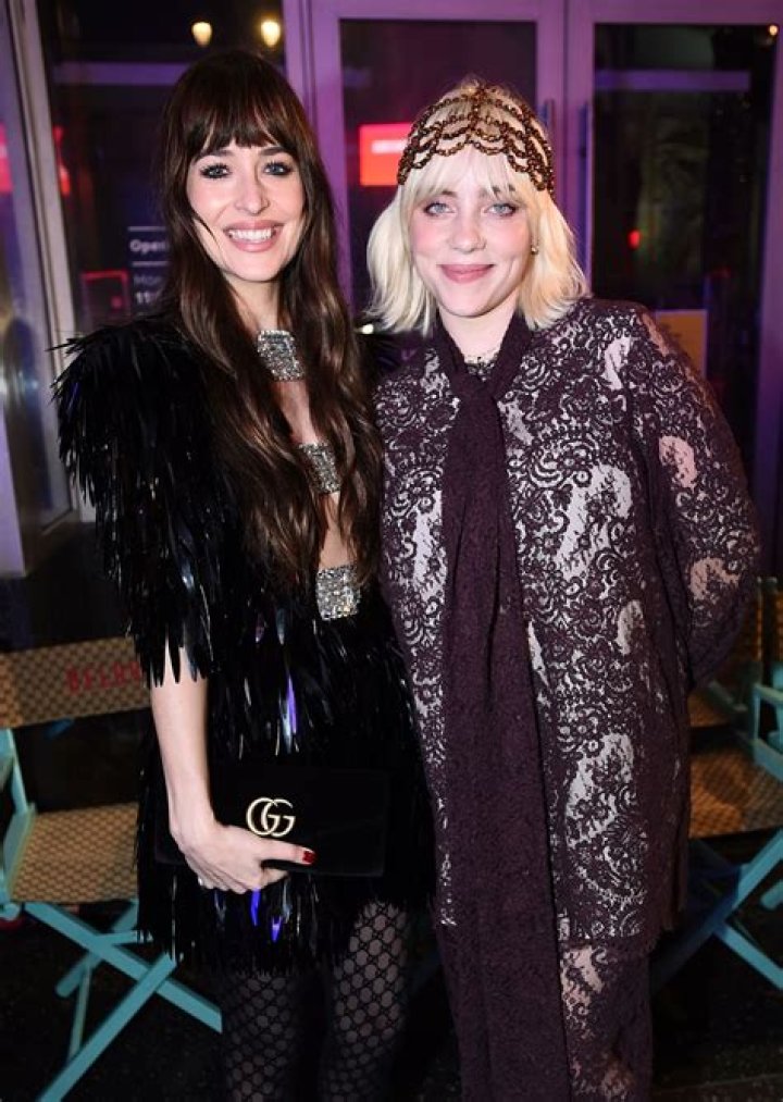 Dakota Johnson and Billie Eilish in the front row Gucci Love Parade show, Front Row, TCL Chinese Theatre, Los Angeles, California, USA - 02 Nov 2021
