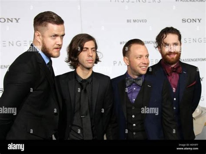 Daniel Platzman, Ben McKee, Dan Reynold, Wayne Sermon. Dan Reynolds, second right, and Daniel Platzman, from left, Ben McKee, and Wayne Sermon, of Imagine Dragons, accept the award for top rock artist at the Billboard Music Awards, at the MGM Grand Garden Arena in Las Vegas 2019 Billboard Music Awards - Show, Las Vegas, USA - 01 May 2019