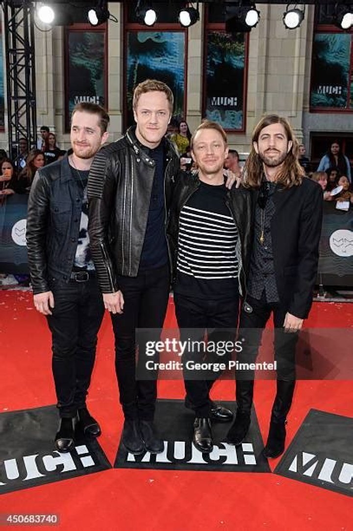 Daniel Platzman, Dan Reynolds, Ben McKee, Wayne Sermon. President's award winners Daniel Platzman, from left, Dan Reynolds, Ben McKee and Wayne Sermon, of Imagine Dragons, arrive at the 67th annual BMI Pop Awards, at the Beverly Wilshire Hotel in Beverly Hills, Calif 67th Annual BMI Pop Awards - Arrivals, Beverly Hills, USA - 14 May 2019