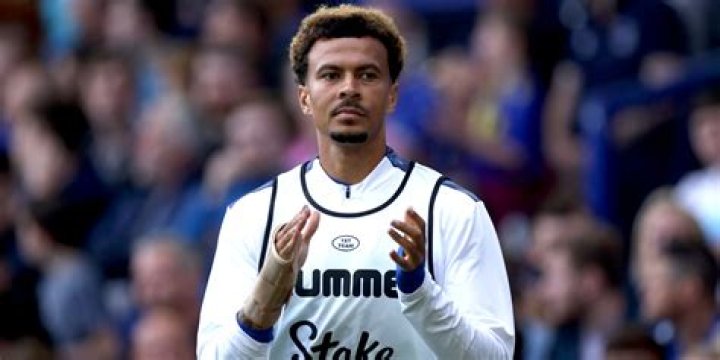 Dele Alli Kneeling To Manage An Injury