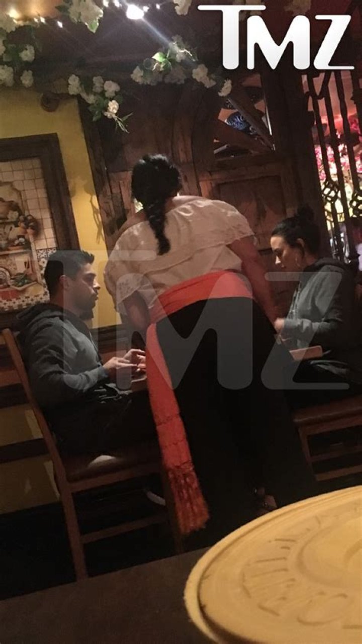 Demi Lovato and Wilmer Valderrama having fun in the water