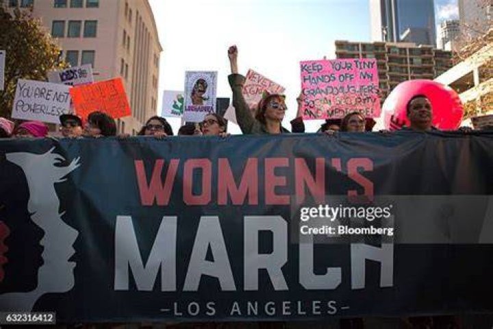Demonstrators march during a Women's March Saturday, Oct. 17, 2020, in Los Angeles. Thousands of women rallied in U.S. cities, to oppose President Donald Trump and his fellow Republican candidates in the Nov. 3 elections. (AP Photo/Marcio Jose Sanchez)