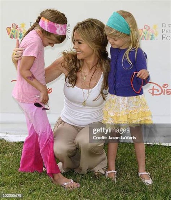 Denise Richards and daughters Sam and Lola go for a swim in the crystal blue ocean in the Bahamas. Denise was wearing a tiny blue bikini and had a blast playing with her girls at the waters' edge. Pix taken April 2. Pictured: Ref: SPL263820 030411 NON-EXCLUSIVE Picture by: SplashNews.com Splash News and Pictures Los Angeles: 310-821-2666 New York: 212-619-2666 London: 0207 644 7656 Milan: 02 4399 8577 World Rights