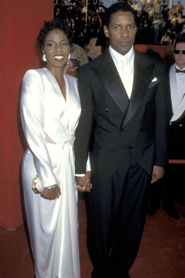 Denzel Washington and Pauletta Washington smile