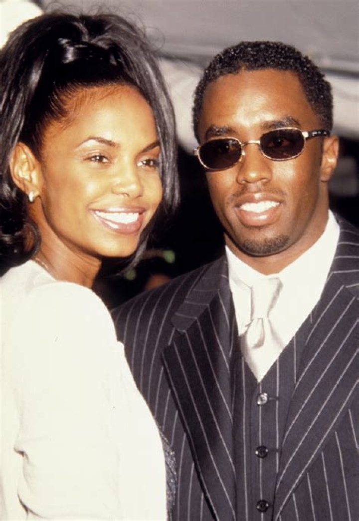 Diddy & Kim Porter with their kids 
