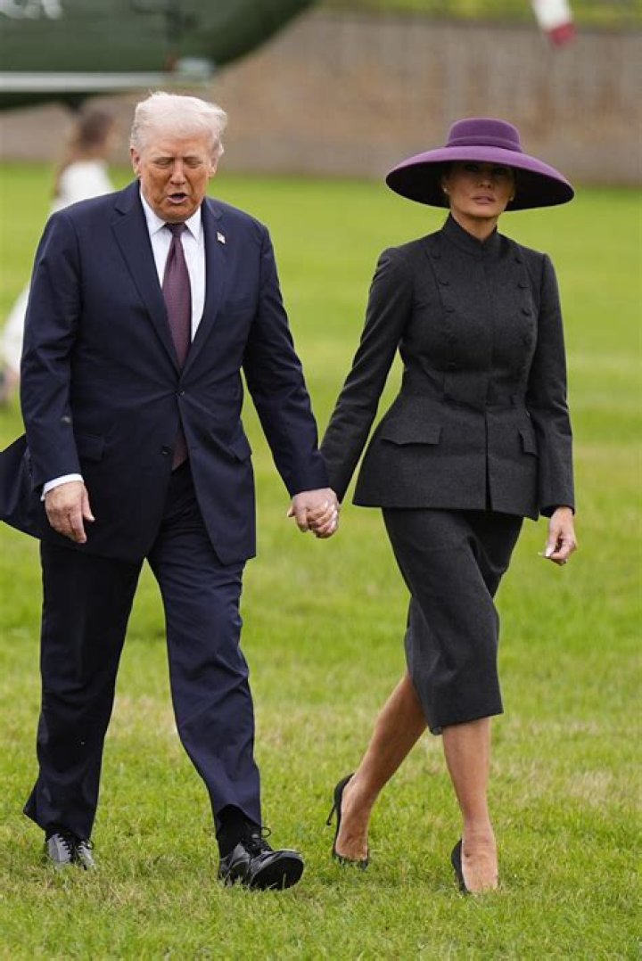 Donald & Melania Trump Holding Hands