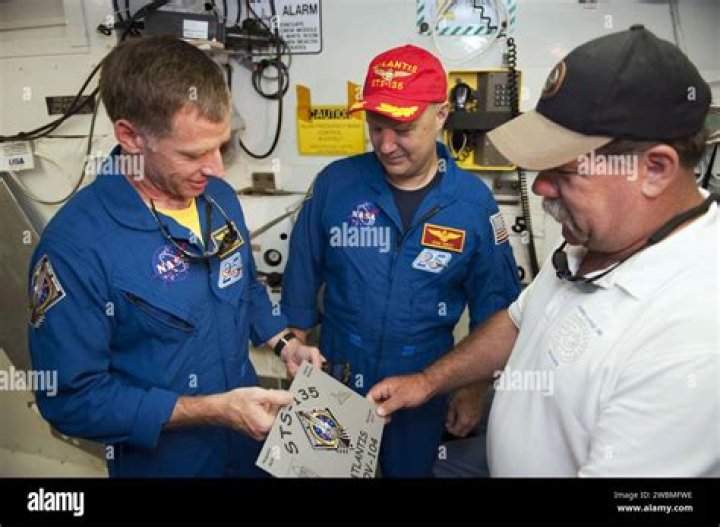 Doug Hurley, Chris Ferguson Space Shuttle Atlantis STS-135 pilot Doug Hurley, left and commander Chris Ferguson, wave after a training flight at the Kennedy Space Center at Cape Canaveral, Fla Space Shuttle