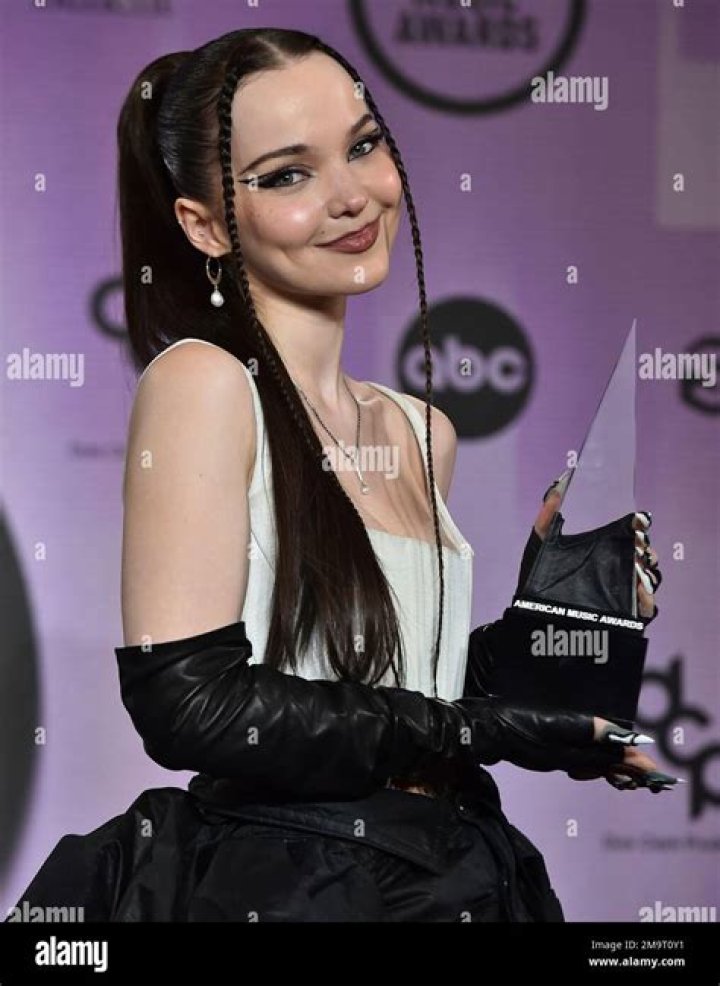 Dove Cameron poses