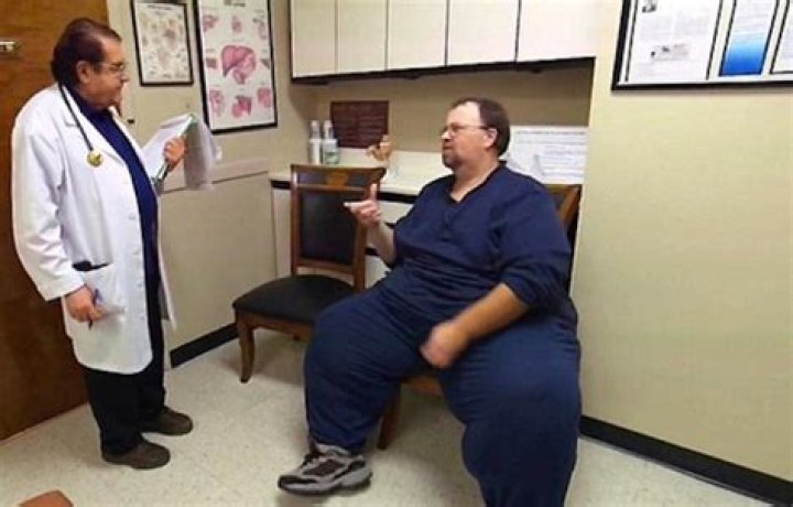 Dr Younan Nowzaradan in discussion with a patient
