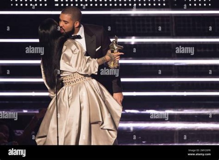 Drake kisses Rihanna as she accepts the Michael Jackson Video Vanguard Award at the MTV Video Music Awards at Madison Square Garden, in New York 2016 MTV Video Music Awards - Show, New York, USA