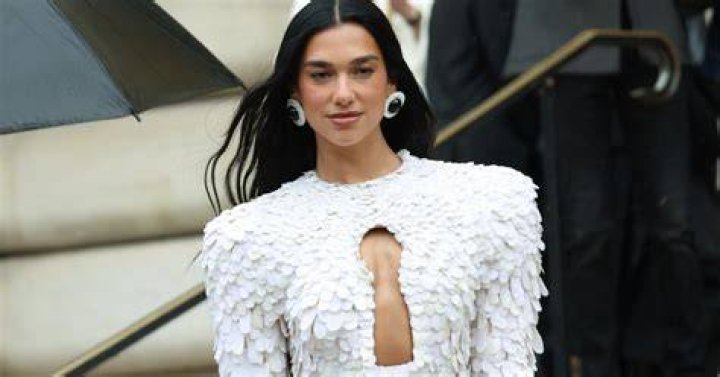 Dua Lipa Rocks A Cutout Bodysuit While Playing Tennis In A New Evian Ad: Watch