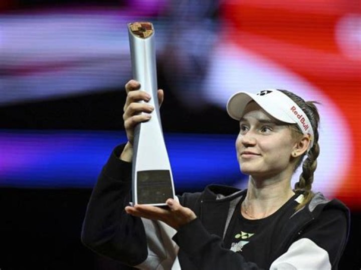 Elena Rybakina holds aloft the Rosewater Dish after victory in Ladies' Singles Final Wimbledon Tennis Championships, Day 13, The All England Lawn Tennis and Croquet Club, London, UK - 09 Jul 2022