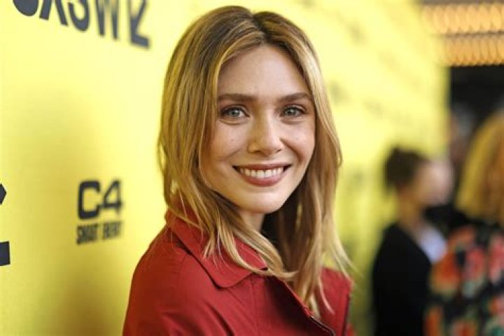 Elizabeth Olsen from the films "Martha Marcy May Marlene" and "Silent House" poses for a portrait in the Fender Music Lodge during the 2011 Sundance Film Festival on Saturday, Jan. 22, 2011 in Park City, Utah. (AP Photo/Victoria Will)