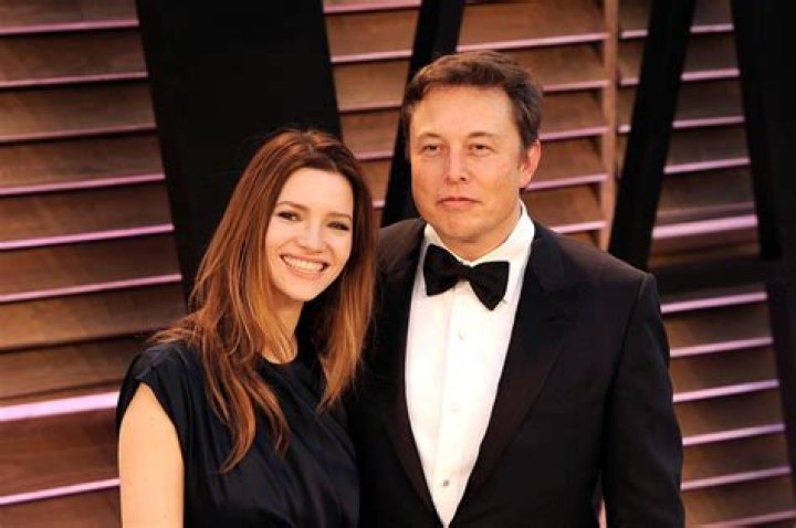 Elon Musk, Talulah Riley, Griffin, Xavier Elon Musk, CEO of Tesla Motors, stands with his fiancee Talulah Riley and his twin sons Griffin, left, 6, and Xavier at the Nasdaq's opening bell to celebrate the electric automaker's initial public offering, Tuesday, June, 29, 2010, in New YorkTesla Motors IPO, New York, USA