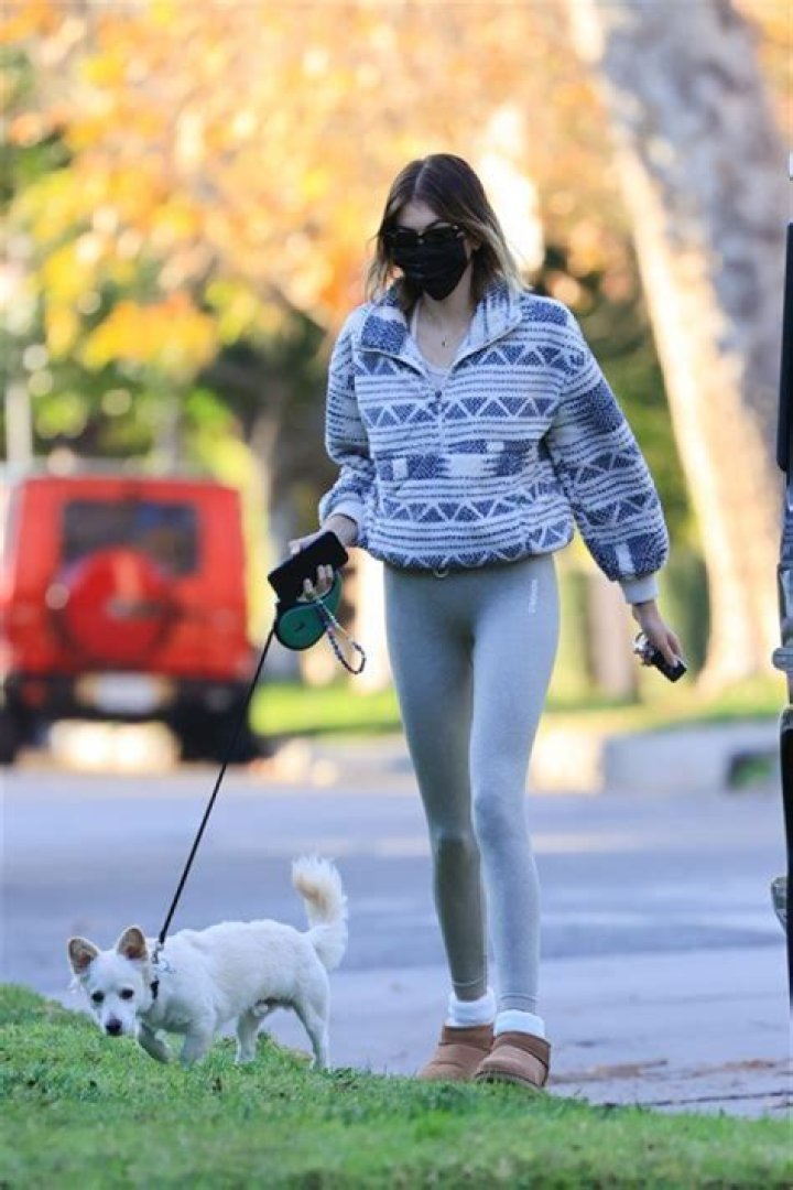 Emily Ratajkowski, Kaia Gerber & More Stars In Comfy Coats Out Walking Dogs & Getting Fresh Air