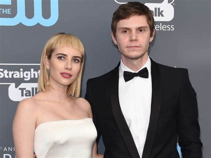 Emma Roberts and Evan Peters Emma Roberts and Evan Peters out and about in Los Angeles, America - 01 Apr 2014 Emma Roberts and boyfriend Evan Peters checking out the latest gossip at the book stands in Los Angeles