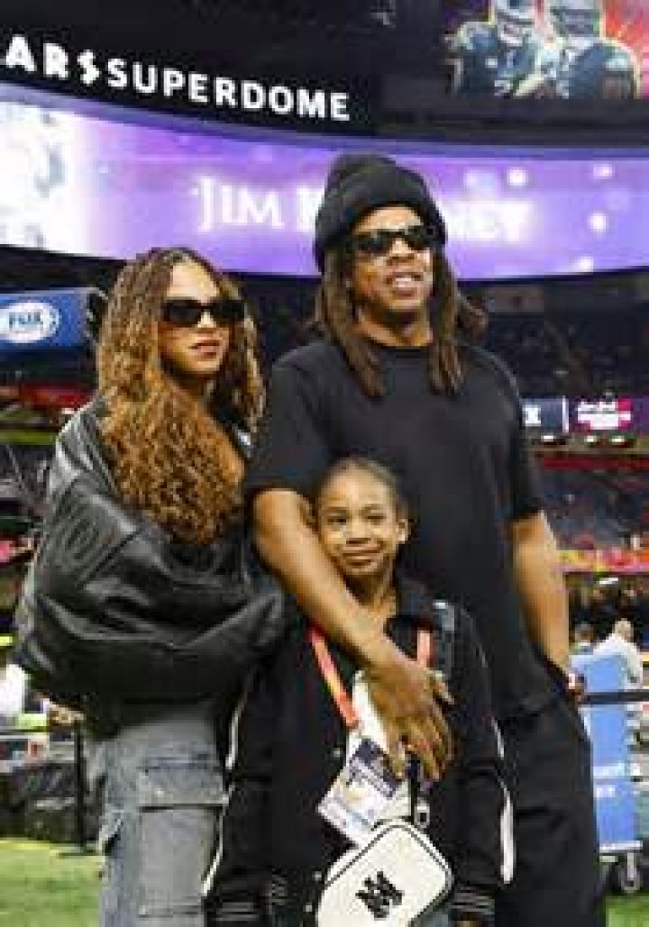 Entertainer Jay-Z embraces his daughter Blue Ivy Carter as they arrive for the NFL Super Bowl 54 football game between the San Francisco 49ers and the Kansas City Chiefs, in Miami 49ers Chiefs Super Bowl Football, Miami Gardens, USA - 02 Feb 2020