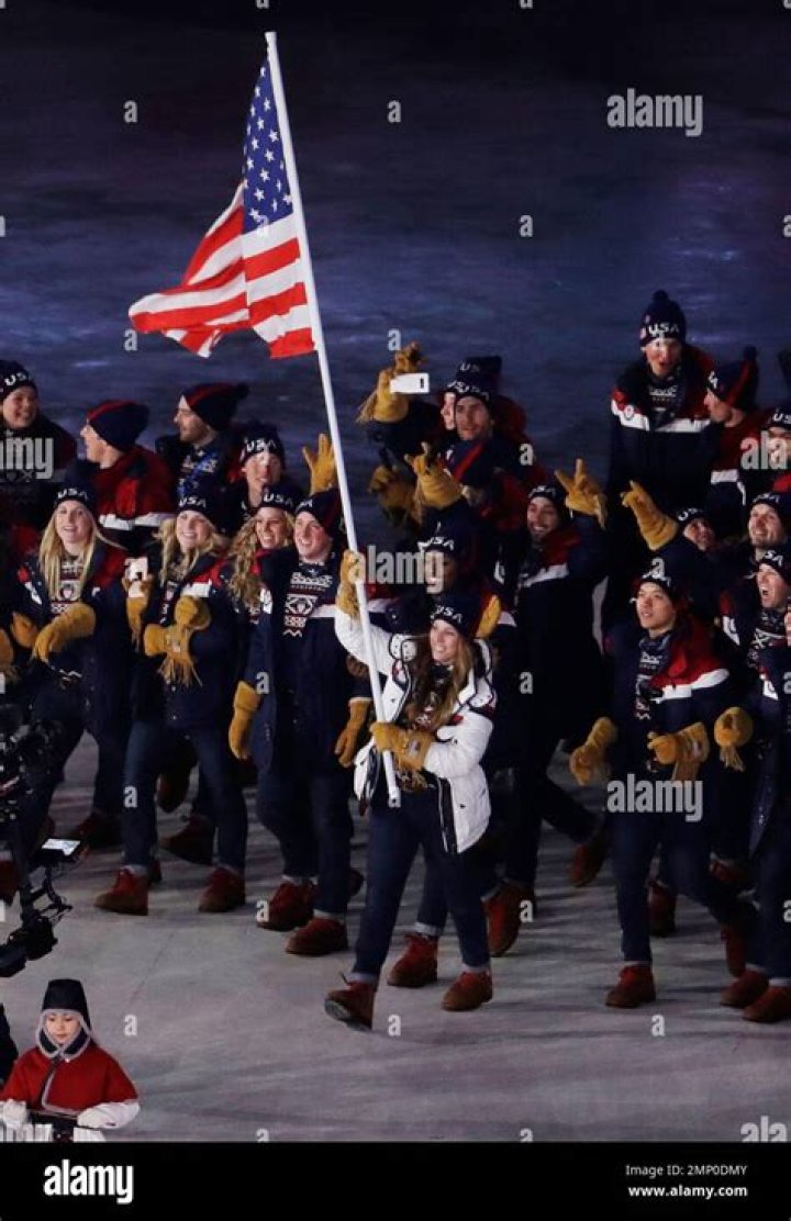 Erin Hamlin carries the flag of the United States during the opening ceremony of the 2018 Winter Olympics in Pyeongchang, South Korea Olympics Opening Ceremony, Pyeongchang, South Korea - 09 Feb 2018