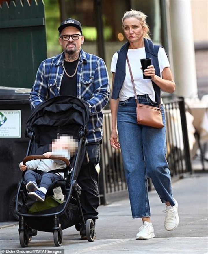 EXCLUSIVE: Cameron Diaz & hubby Benji Madden make a rare public appearance as they wait around for a table at Sugarfish sushi in Beverly Hills. 11 Jul 2019 Pictured: Cameron Diaz, Benji Madden. Photo credit: MEGA TheMegaAgency.com +1 888 505 6342 (Mega Agency TagID: MEGA464459_005.jpg) [Photo via Mega Agency]