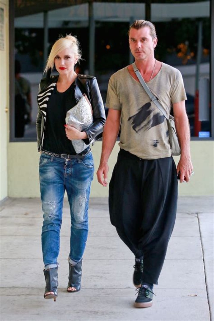 EXCLUSIVE: Gwen Stefani and Gavin Rossdale have a rare co-parenting bonding moment together at the end of Apollo's flag football game while both consoling their youngest son after his team suffered a tough loss in Los Angeles on Sunday. Gwen went to the game solo without Blake Shelton and sat in the stands with other parents while Gavin rooted from the sidelines with his girlfriend Courtlyn Cannan who he brought to the game. They ignored each other the whole game until after the match when they both wanted to console their crying son Apollo who was upset about losing his flag football contest. 16 Oct 2022 Pictured: Gwen Stefani and Gavin Rossdale having a co-parenting bonding moment together at the end of Apollo's football game. Photo credit: Garrett Press / MEGA TheMegaAgency.com +1 888 505 6342 (Mega Agency TagID: MEGA908631_001.jpg) [Photo via Mega Agency]