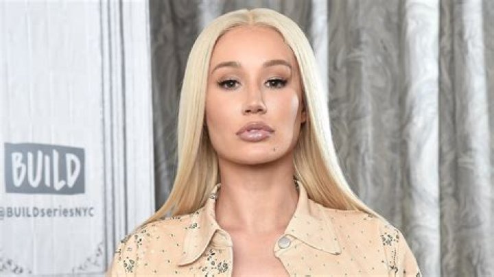 EXCLUSIVE: Iggy Azalea was spotted out in Beverly Hills on Wednesday evening, as she made a stop for Frozen Greek Yogurt . The stylish rapper wore a Vivienne Westwood Corset, and Jacket along with a Bold Christian Dior Statement necklace . She wore a black face mask to stay safe , and carried a Dior Saddle bag , to complete her stylish look. She took to instagram today to deny any involvement in a lawsuit directed at French Montana's Brother, who hit a man with a car that belonged to Azalea. 22 Jul 2020 Pictured: Iggy Azalea. Photo credit: MEGA TheMegaAgency.com +1 888 505 6342 (Mega Agency TagID: MEGA690320_001.jpg) [Photo via Mega Agency]