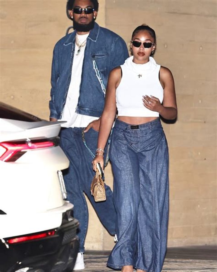 EXCLUSIVE: Jordyn Woods shows off her curves in a orange dress as she and Karl-Anthony Towns grab dinner at Nobu Malibu in Malibu. 07 Oct 2020 Pictured: Jordyn Woods And Karl-Anthony Towns. Photo credit: Photographer Group/MEGA TheMegaAgency.com +1 888 505 6342 (Mega Agency TagID: MEGA706067_001.jpg) [Photo via Mega Agency]